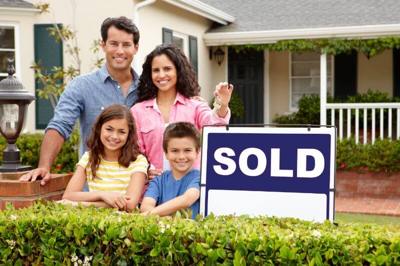 agent with sold sign